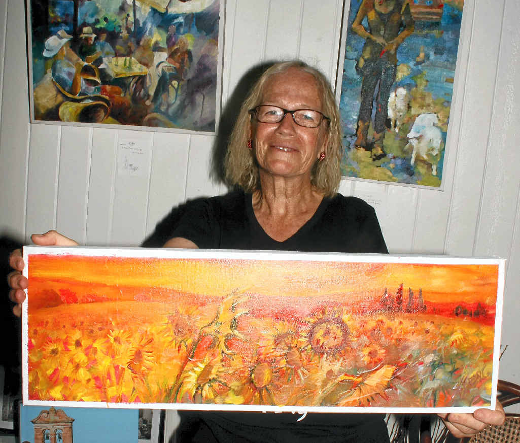 ARTISTIC OUTLET: Co-owner of Art on King, Sue Keong, displays her art at the opening of Art on King on Friday. ARTISTIC OUTLET: Co-owner of Art on King, Sue Keong, displays her art at the opening of Art on King on Friday.